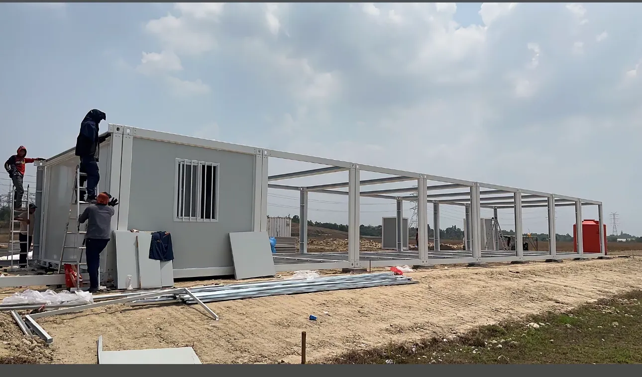 Workers assembling a flat pack frame on site